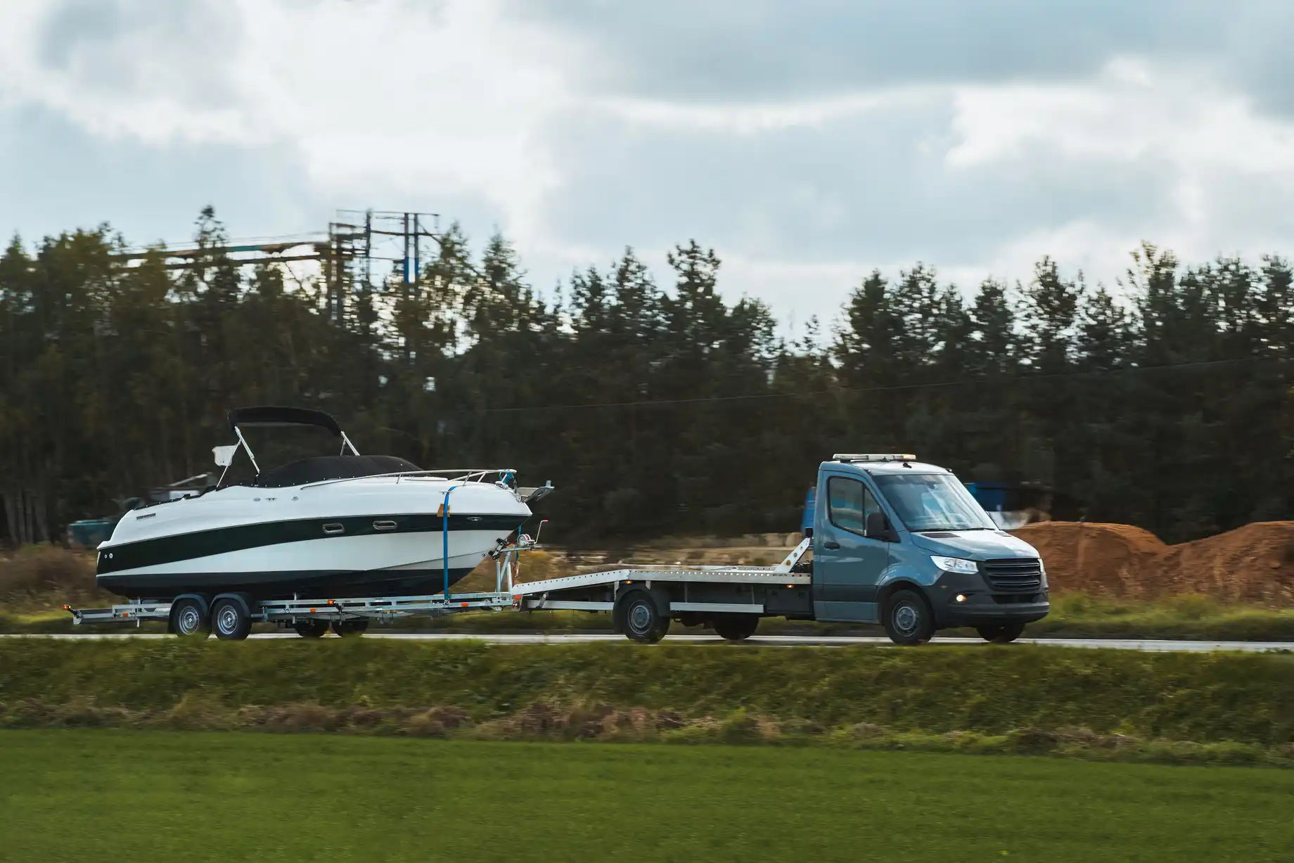 Boat being towed on trailer